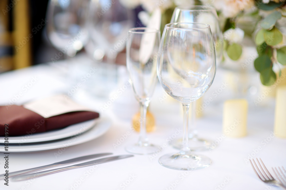 Beautiful table set for some festive event or wedding reception Beautiful table set for some festive event or wedding reception