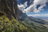 Trail down from the plateau Roraima passes under a falls - Venez