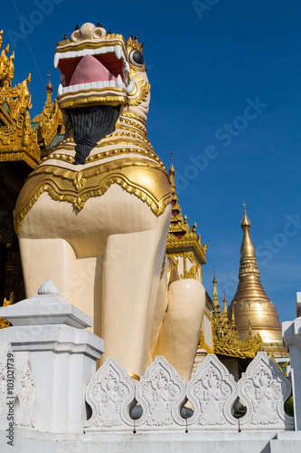 Chinthe statue guarding the entrance at the Shwedagon pagoda photo