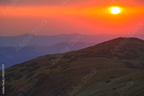 Gorgeous vibrant scenic mountain landscape, sunrise in Carpathia