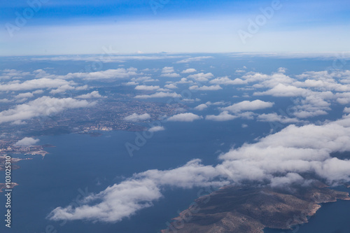 Blue sky with clouds and mountains background  aerial photography