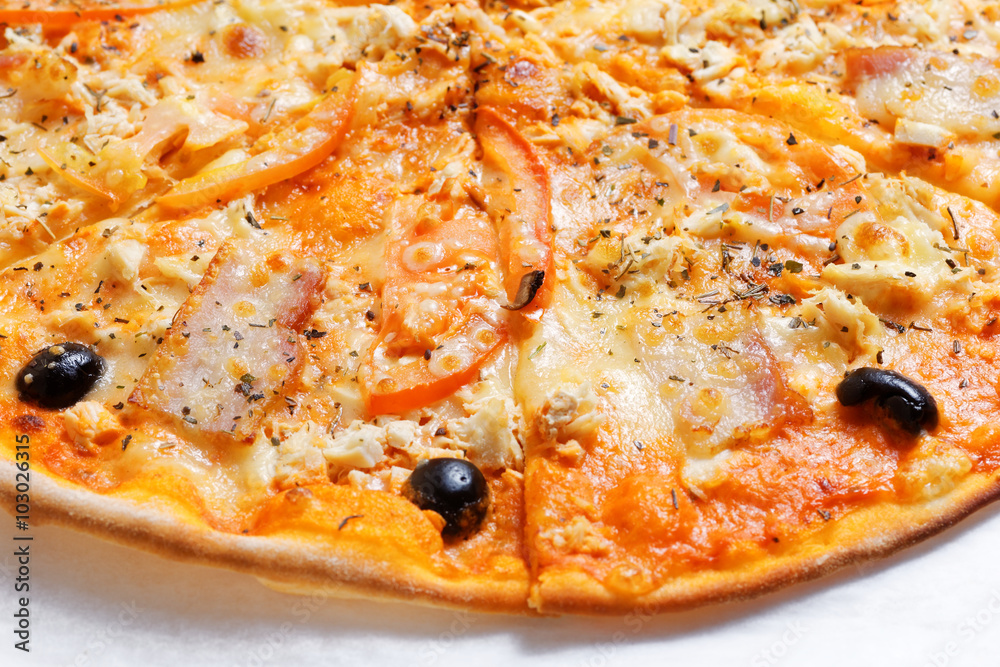 Freshly baked sliced pizza with olives Freshly baked sliced pizza with olives