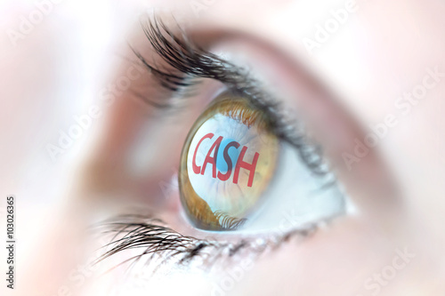 Cash reflection in eye.  photo