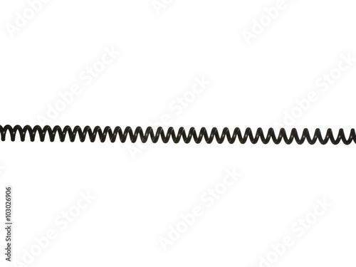 Black coiled electric cable isolated on white background.