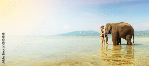 Photography Woman and elephant in the sea. Thailand vacation. Banner edition.