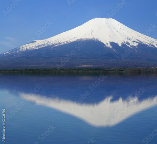 view of Mount Fuji with mirror reflection in lake, Japan