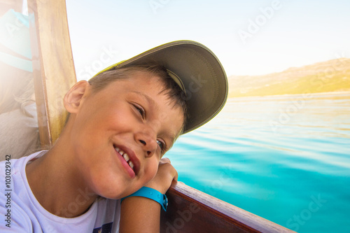 boy on yacht