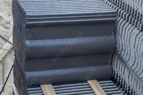 stack of concrete roof tile  gray color  at construction site