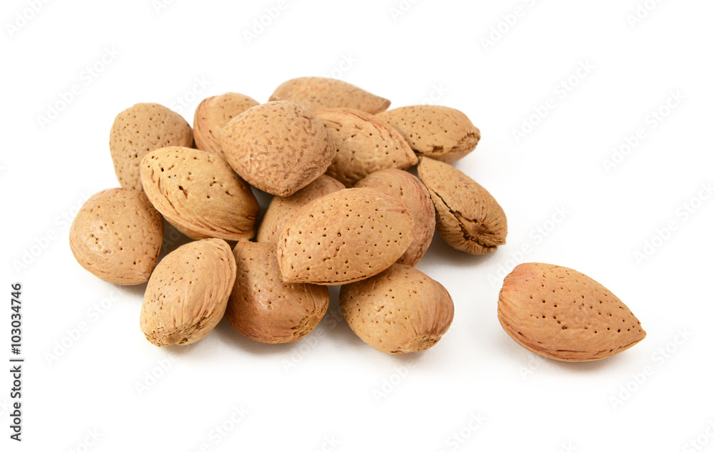 Small heap of whole almonds in shells Small heap of whole almonds in shells