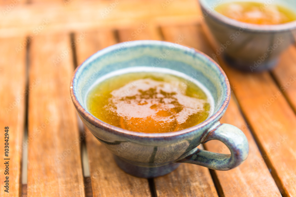 Norman apple cider in a typical ceramic cups Norman apple cider in a typical ceramic cups