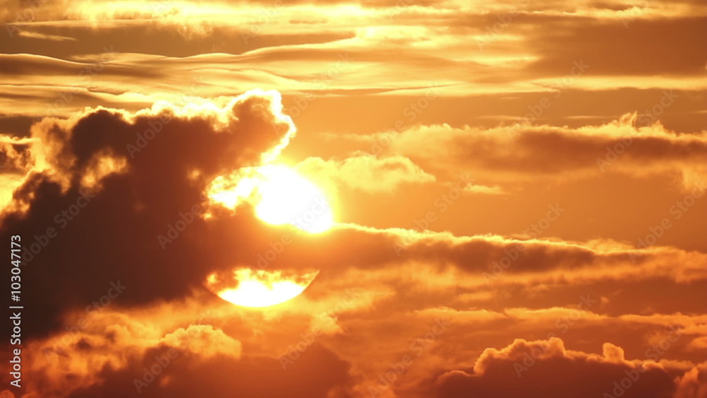 The Big Sun Behind The Clouds