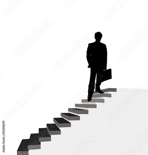 Geschäftsmann oben auf einer Treppe stehend