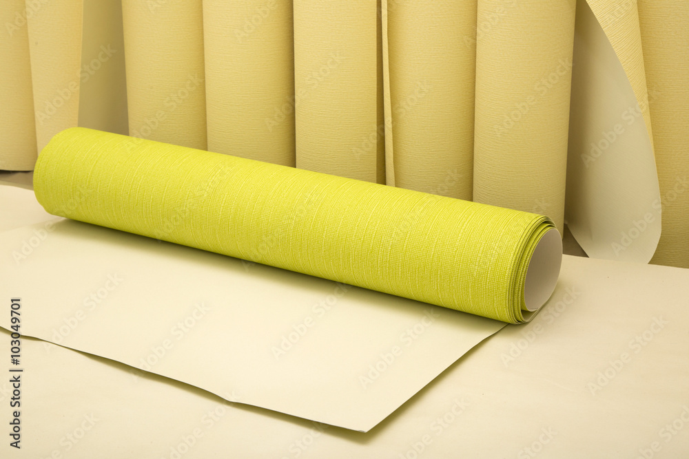 Fototapeta premium Rolls of wallpaper before applying on the wall
