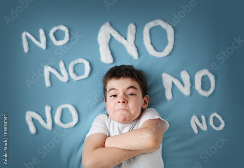 bad boy on blue blanket background