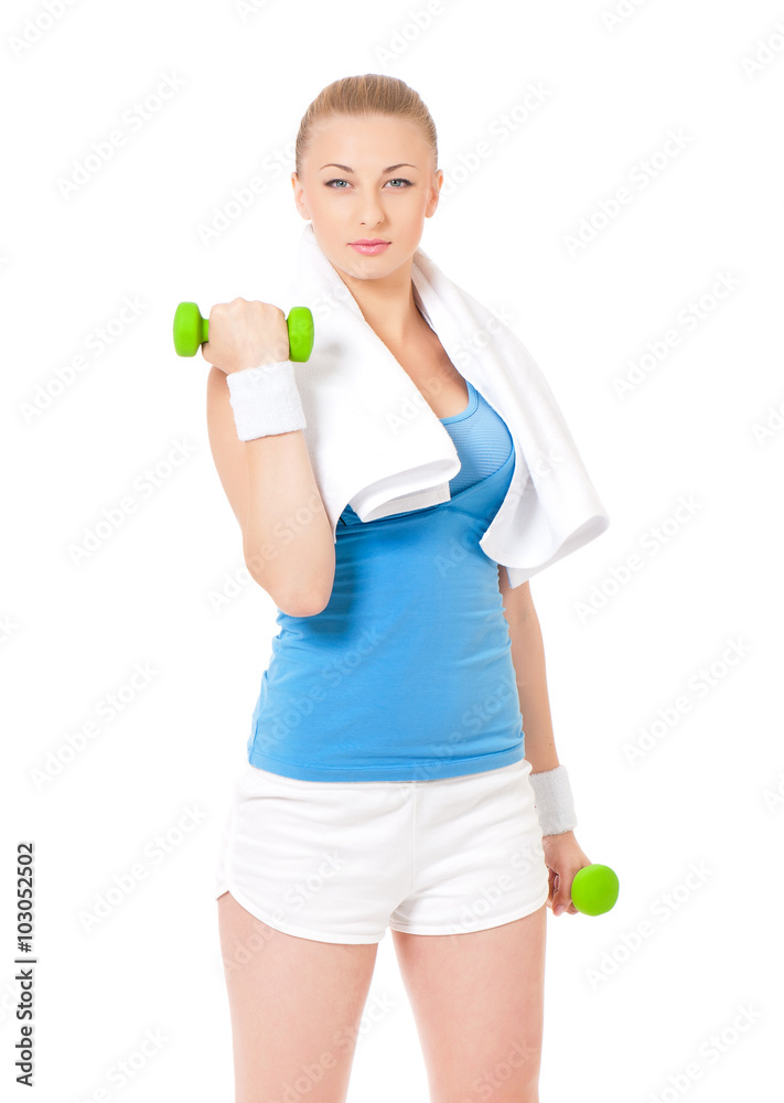 Naklejka premium Young woman in fitness wear exercising with dumbbells