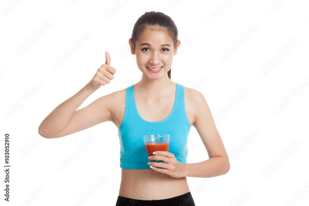 Beautiful healthy Asian girl thumbs up with tomato juice Beautiful healthy Asian girl thumbs up with tomato juice