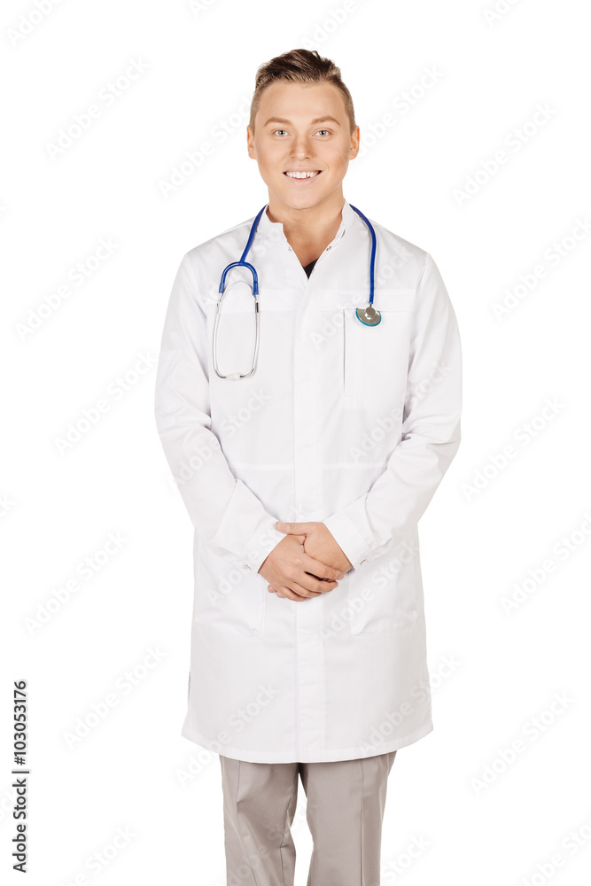 young male doctor in white coat with stethoscope. People and medicine concept. Image isolated on a white studio background. young male doctor in white coat with stethoscope. People and medicine concept. Image isolated on a white studio background.