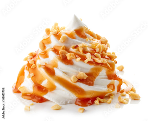 whipped cream with caramel sauce on white background photo