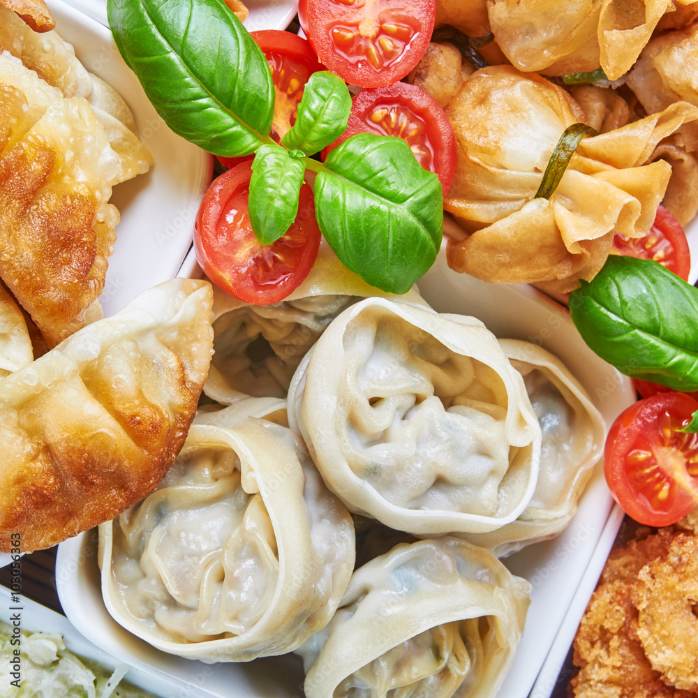Asian snacks in white bowls