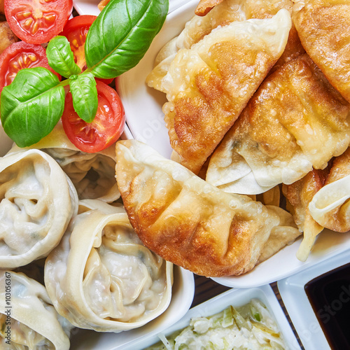 Asian snacks in white bowls