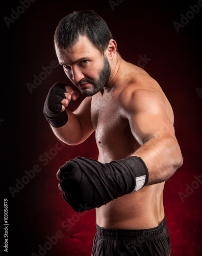 street-fighter, cuff fist close up on camera. hard light   © Dmytro Sandratskyi
