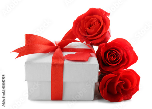 Gift box  rose flowers and decorative heart  isolated on white