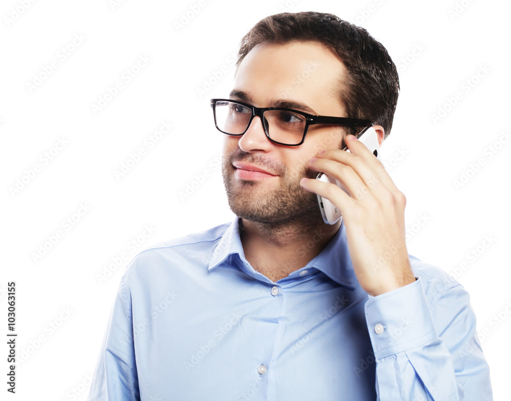 Young business man using mobile phone. Young business man using mobile phone.