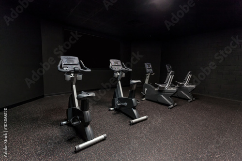 Exercise Bikes In Room with Black Screen For Replacement