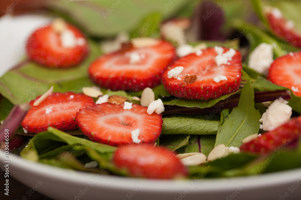 Closeup of a healthy salad with strawberries Closeup of a healthy salad with strawberries
