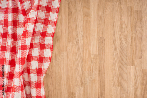empty wooden cutting board and cloth red napkin