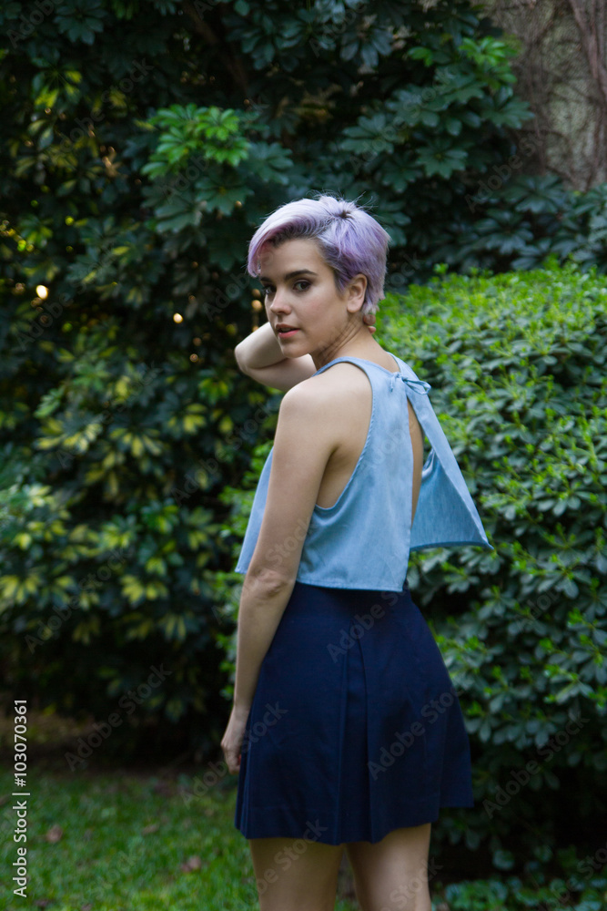 Violet short-haired female holding her neck Violet short-haired female holding her neck