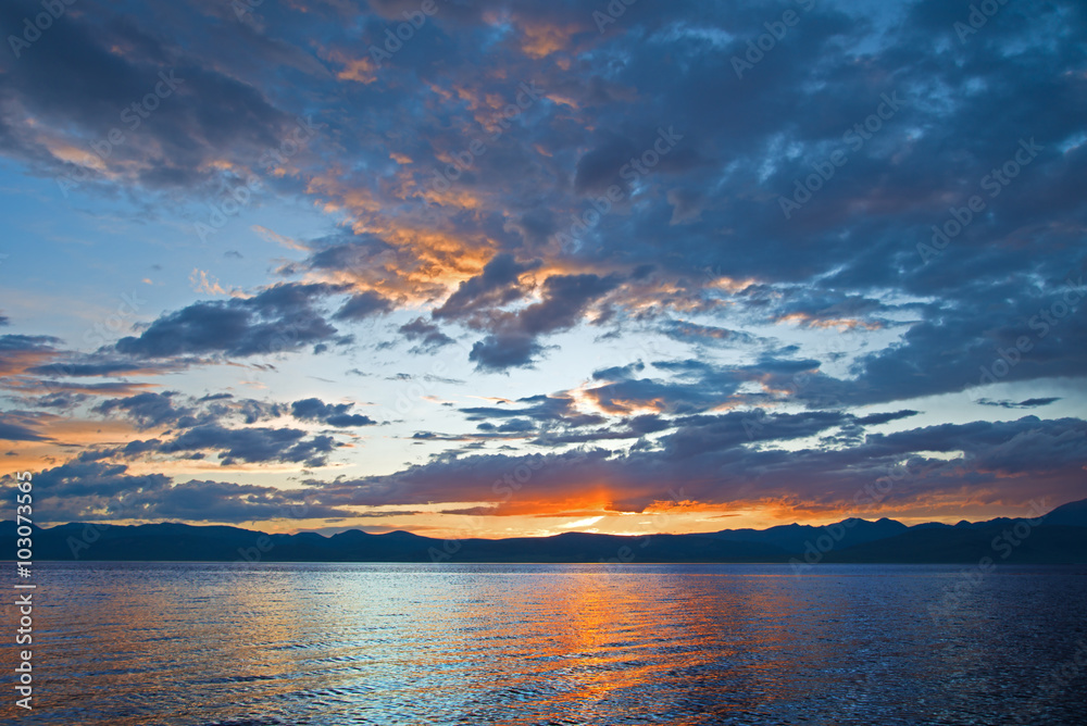Colorful dramatic sunset over the lake Hovsgol, Mongolia 