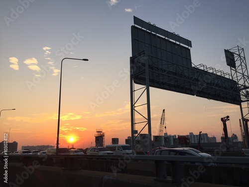 Obraz na plátně billboard beside tollway under sunset