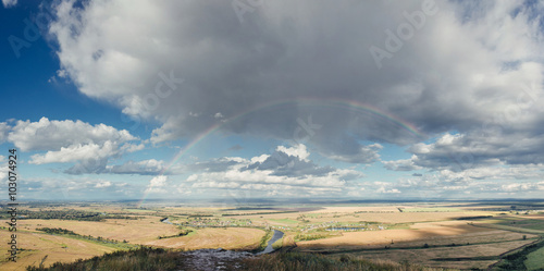 Beautiful panorama landscape with a rainbow in the sky aerial view