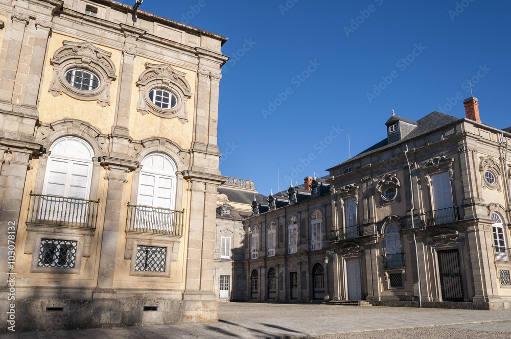 View of the Royal Palace of La Granja de San Ildefonso from the Horseshoe Courtyard, Segovia, Spain. It is an 18th-century palace in a restrained baroque style