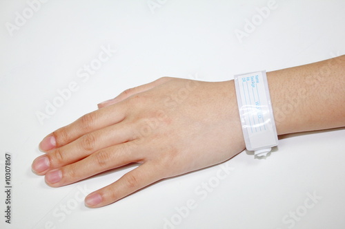 hand with patient identification bracelet