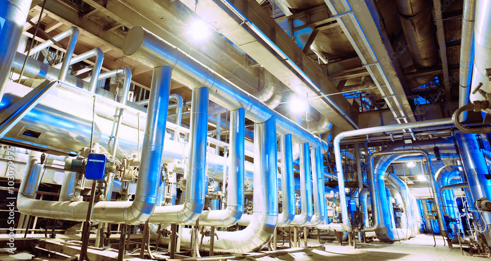 Equipment, cables and piping as found inside of a modern industr Equipment, cables and piping as found inside of a modern industr