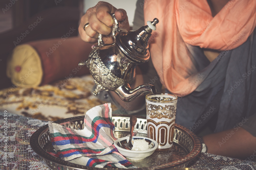 Moroccan teapot and cup to drink the famous mint.