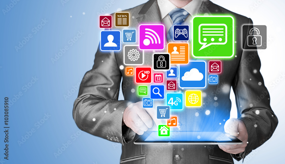 Business man using tablet PC with social media icon set Business man using tablet PC with social media icon set