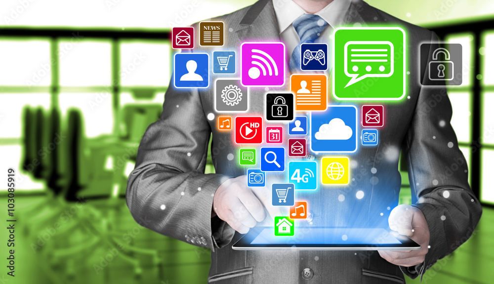 Business man using tablet PC with social media icon set Business man using tablet PC with social media icon set