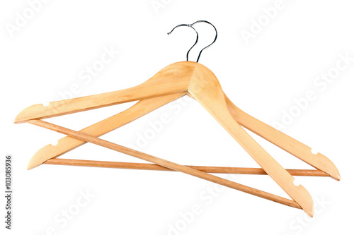 many wooden hangers on white isolated background