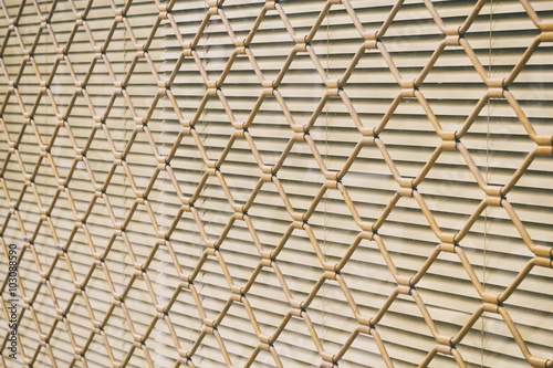 Grating covering a window