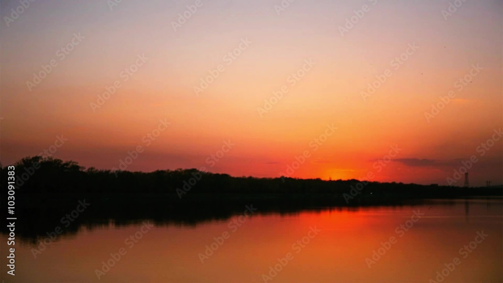 sunset over the river timelapse. sunset over the river timelapse.