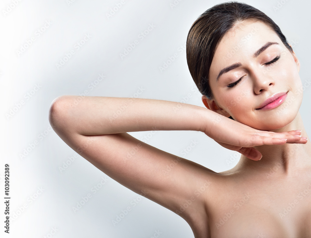 Young beautiful woman. perfect skin. armpit's care Young beautiful woman. perfect skin. armpit's care