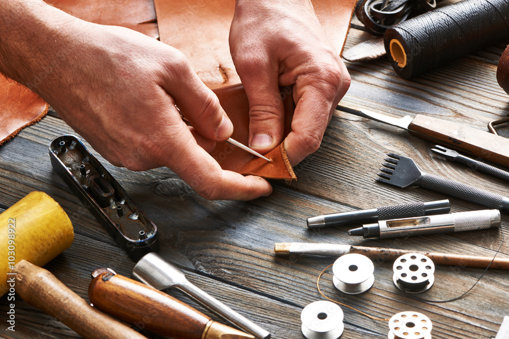 Man working with leather Man working with leather