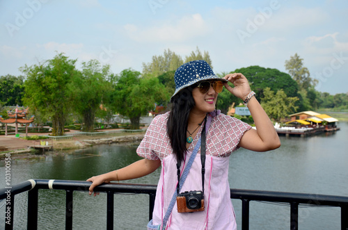 Thai women travel and portrait at the Bridge over the River Kwai