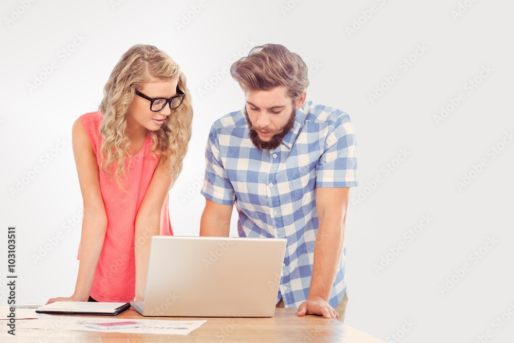Composite image of man using laptop while discussing with woman Composite image of man using laptop while discussing with woman