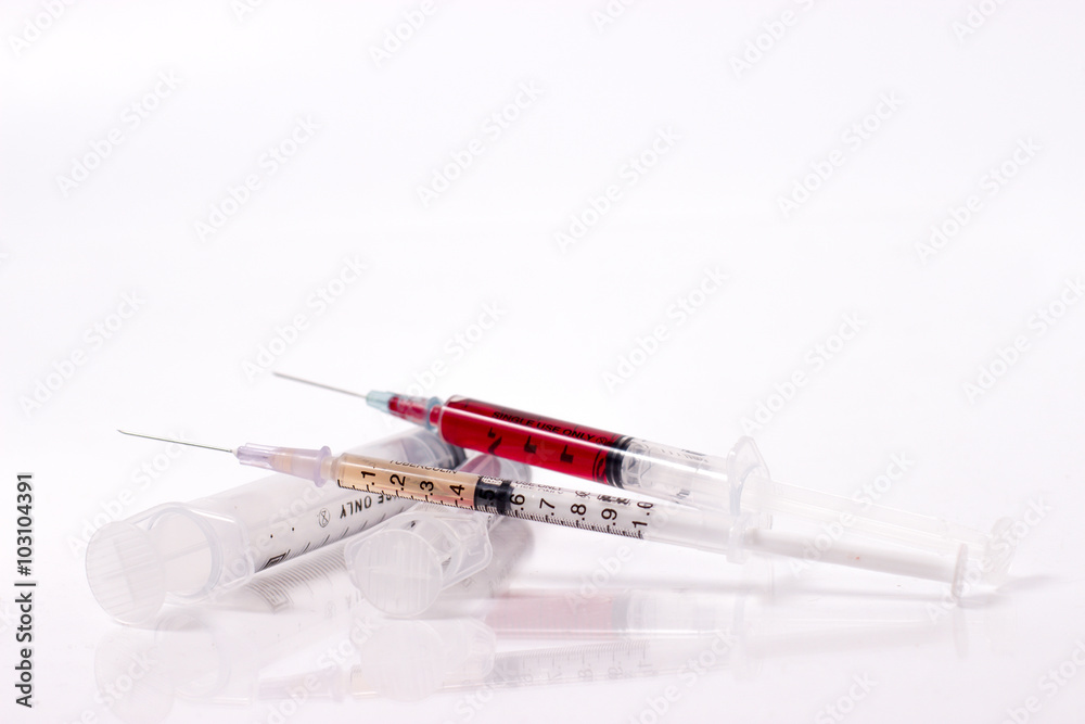 blood and vaccine in syringe blood and vaccine in syringe