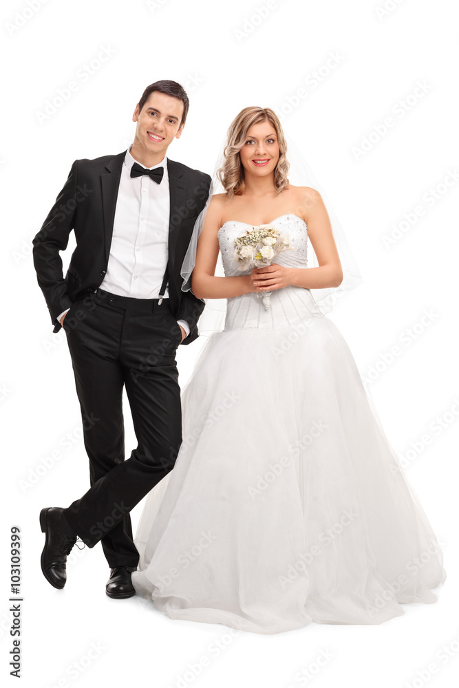 Young newlywed couple posing together Young newlywed couple posing together