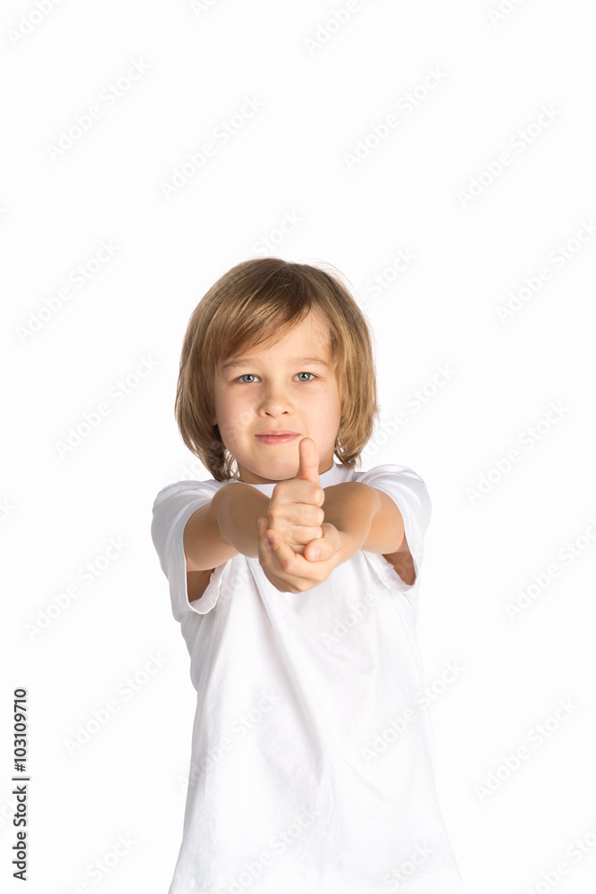 Portrait of happy boy showing thumbs up gesture Portrait of happy boy showing thumbs up gesture